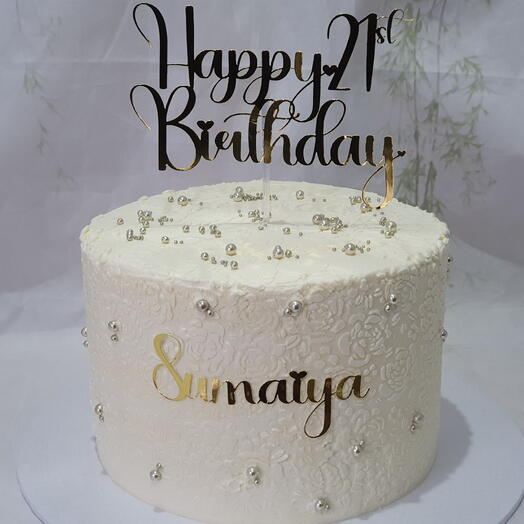 Birthday cake with stencilled roses