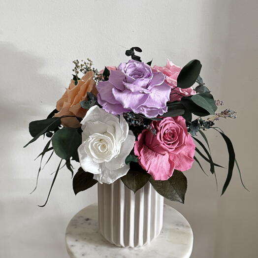 Forever rose in white vase that last long