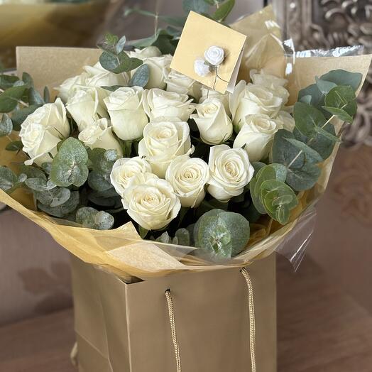 Beautiful white rose and eucalyptus flower bouquet
