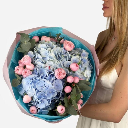 Blue Breeze (blue hydrangeas, spray roses and eucalyptus )