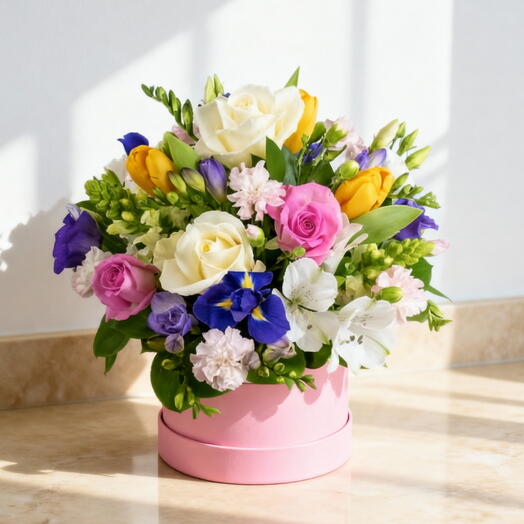 Mix spring flower arrangement in a box